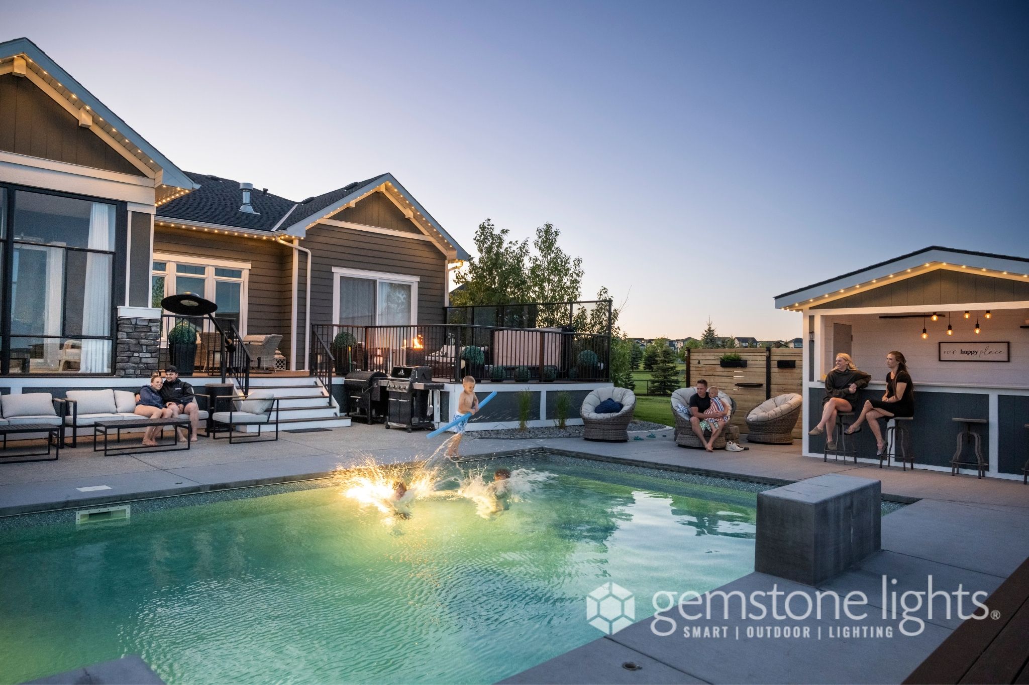 Calgary backyard pool area with Gemstone Lights ambient LED lighting — Calgary Permanent Lights, authorized Gemstone dealer