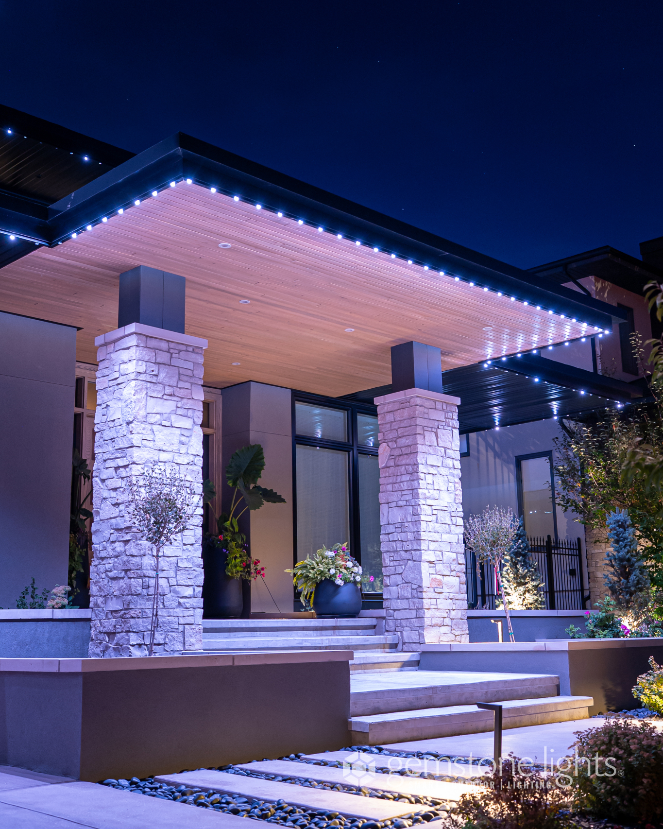 Modern prairie contemporary Calgary home with warm white architectural soffit Gemstone lighting — Calgary Permanent Lights