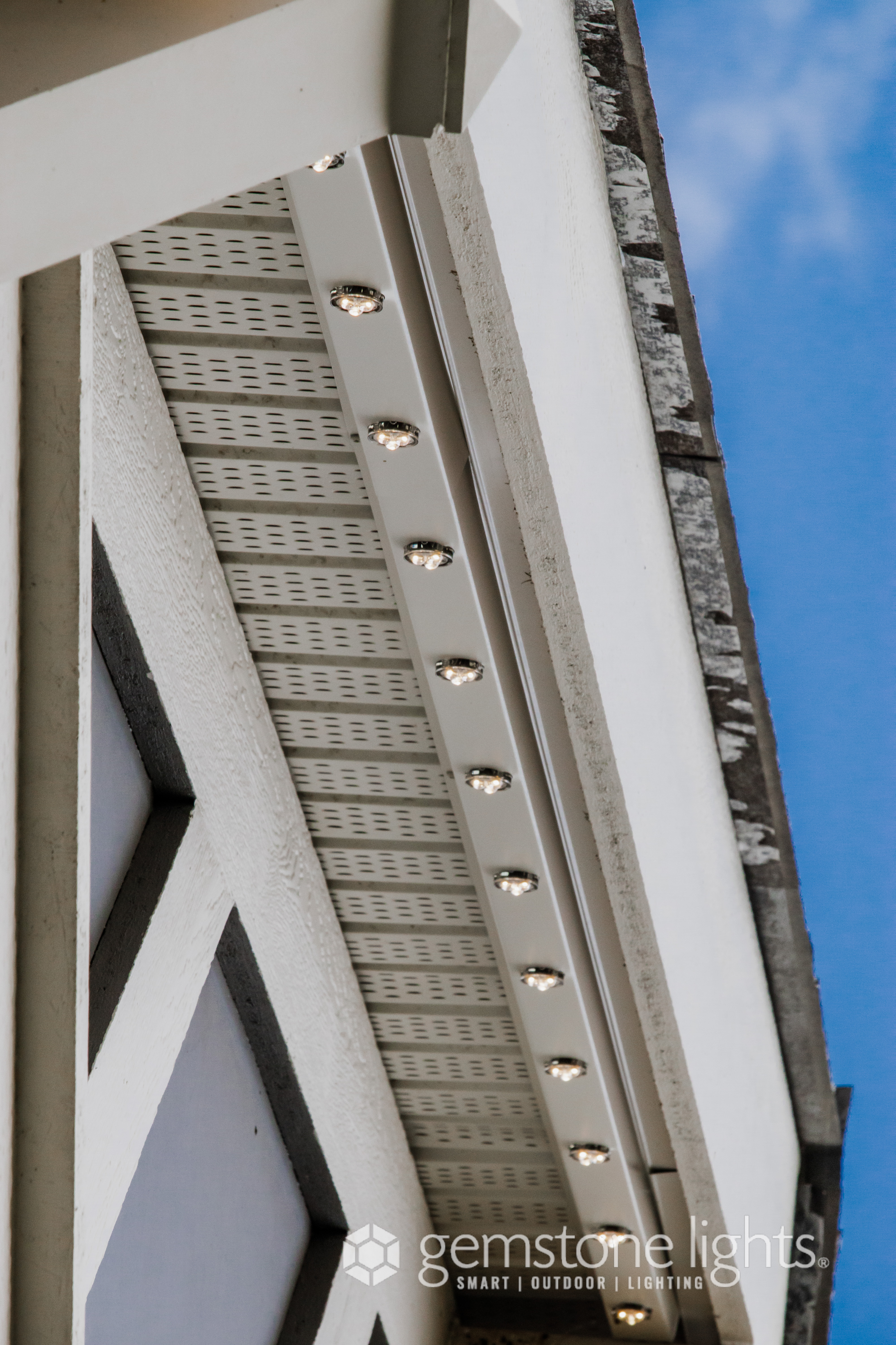 Close-up of Gemstone Lights LED track installed on Calgary home fascia — precision soffit-mounted installation by Calgary Permanent Lights